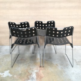 Set of 4 black Omstak chairs, Rodney Kinsman