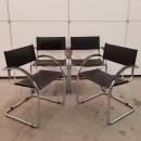 Set of 4 black Mart Stam style armchairs