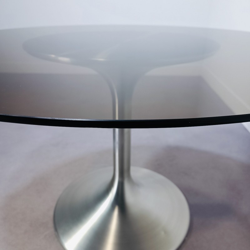 Round tulip base dining table with glass top