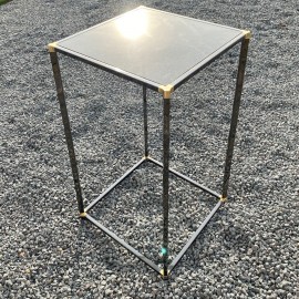 Tall black and messing tubular pedestal table